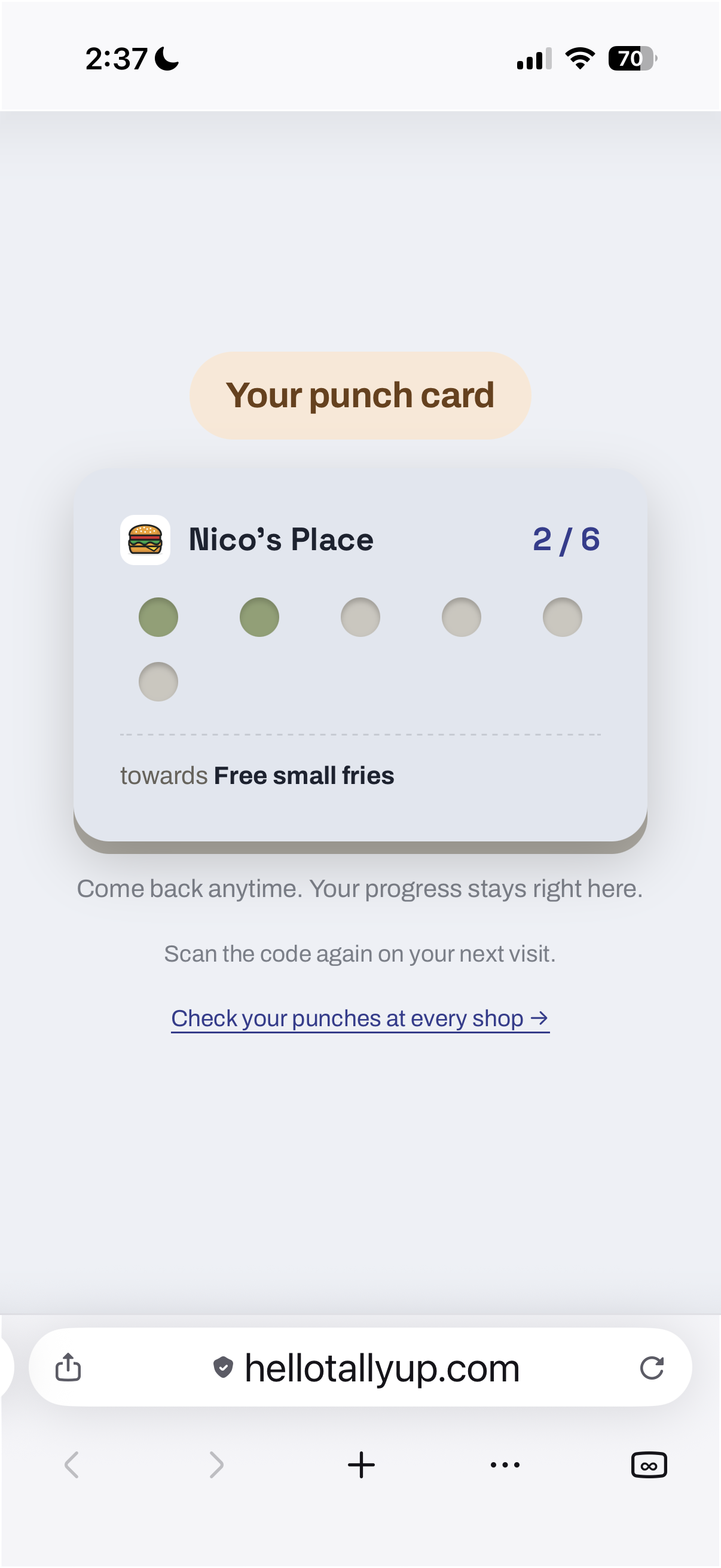 A customer's punch card showing 2 of 6 visits toward a free reward